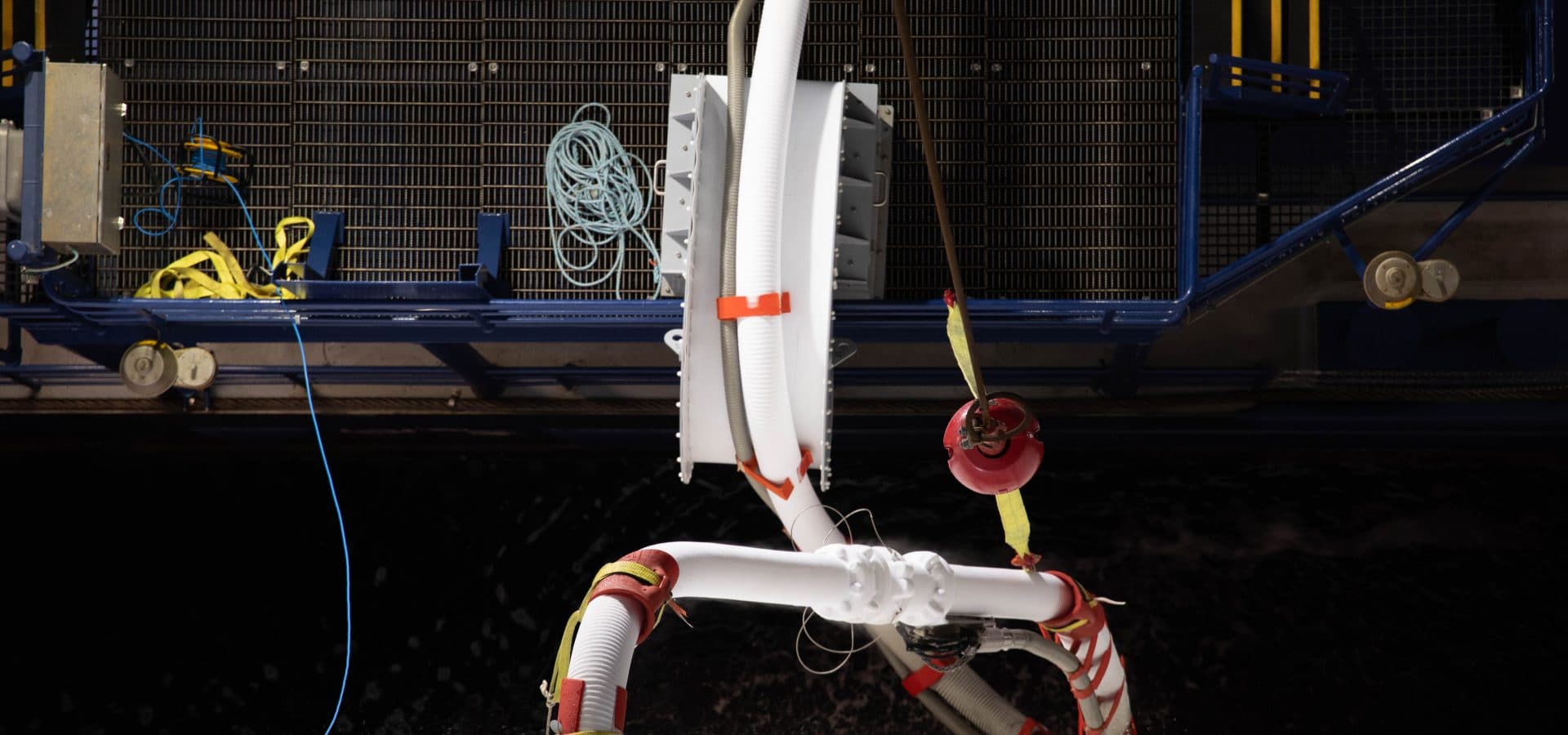 A close-up view of the hose connection from ship-to-ship.